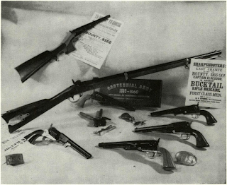 Lack of War surplus shooting irons, such as Bannerman once sold, sparked renaissance of percussion firearms fabrication on mass scale in Italy and Belgium in late 1950s. Arms shown are products from the firms Navy Arms Co. and Centennial Arms Corp., both productions being set up abroad by author.