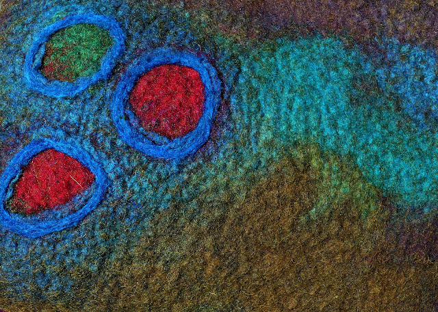 Closeup view of the decorative detail on the front section of the felted BoHo Bag.