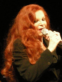 Milva during a performance in 2009, captivating audiences at the age of 70
