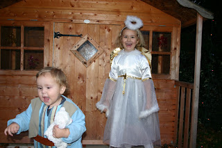 Top Ender dressed as an Angel with Baby Boy dressed as a shepherd running away