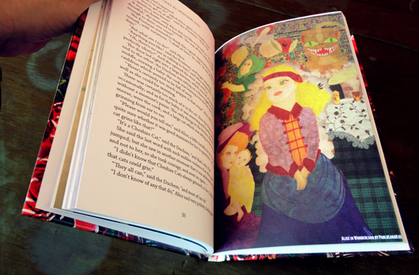 Alice in Wonderland book open with illustration of The Cook