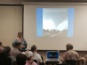 photo of Lori Hodges, Larimer County Emergency Manager, speaking at Disaster Assistance Center