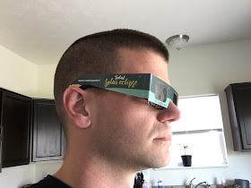 side view eclipse glasses over regular glasses
