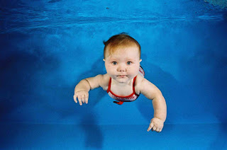 very cute little girl in pool