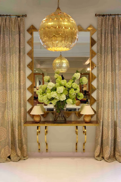 vignette styling console table gold accessories oversized mirror