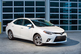 Front 3/4 view of 2015 Toyota Corolla LE Eco Premium