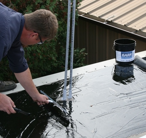 applying a clear waterproof sealant to your home in winter