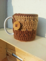 https://laventanaazul-susana.blogspot.com.es/2014/11/127-funda-para-taza-crochet.html