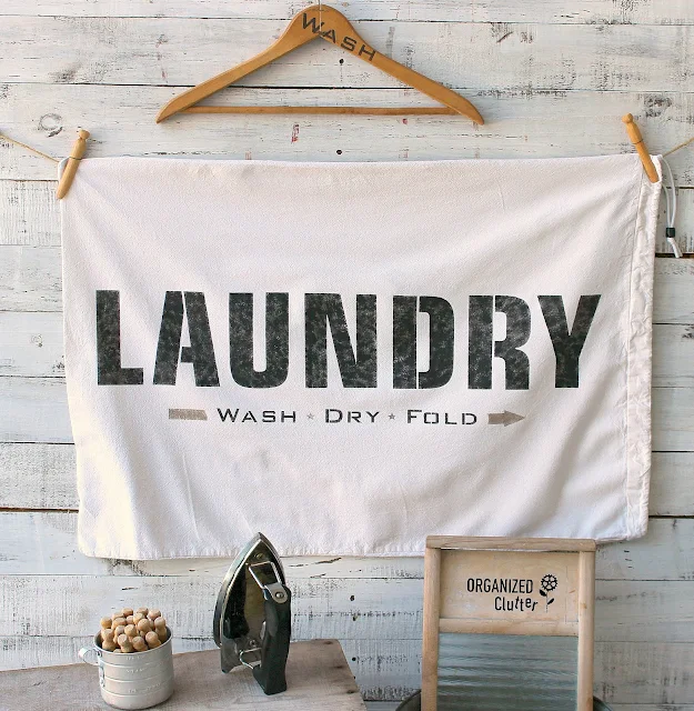 Thrift Shop Laundry Bag Becomes Laundry Room Decor With Stencils #oldsignstencils #fusionmineralpaint #laundrysign #laundryroom #laundryroomdecor #stencil #thriftshopmakeover