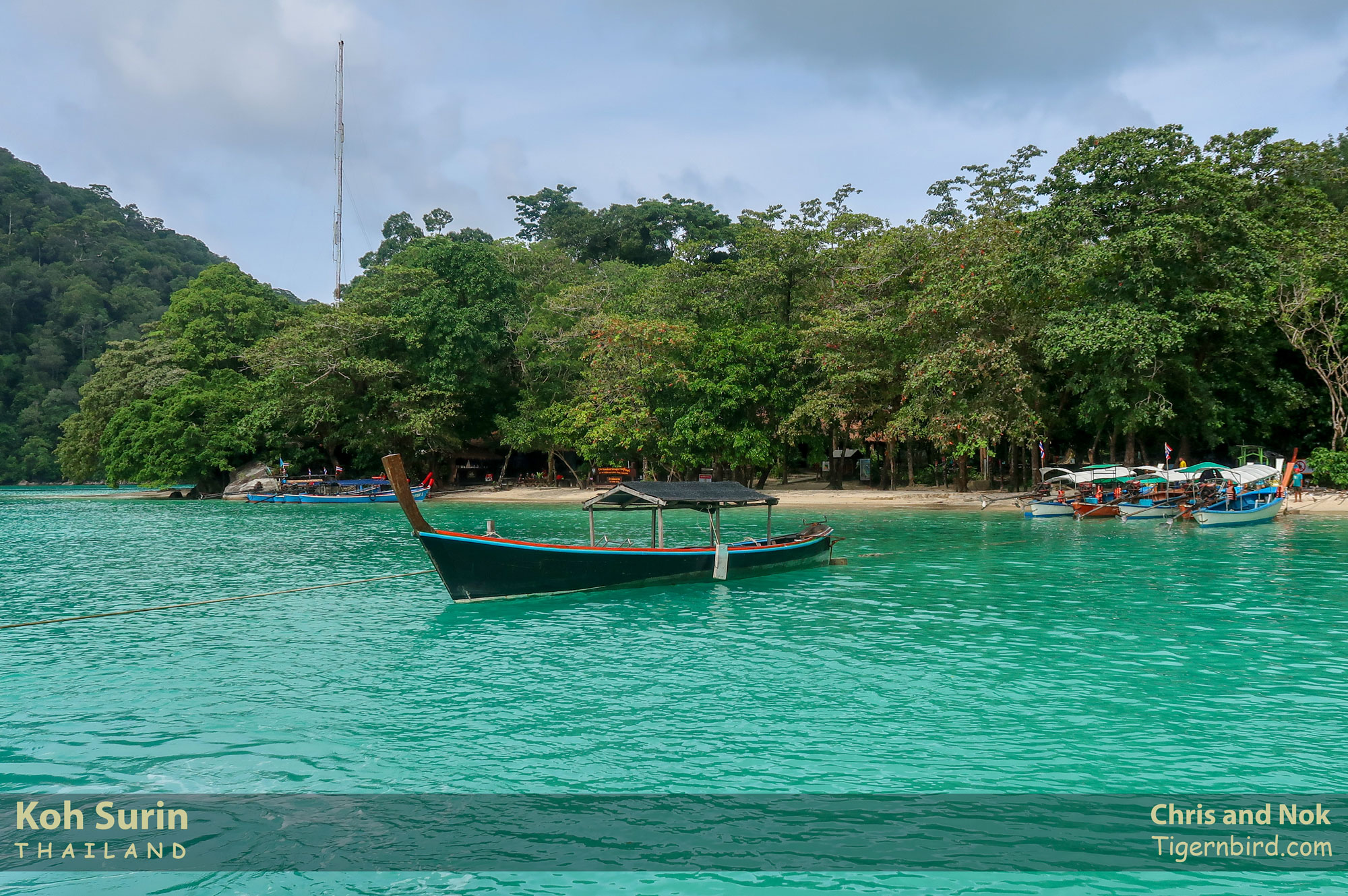 Longtail boat moored in Chong Khat Bay at Mu Ko Surin National Park in Thailand