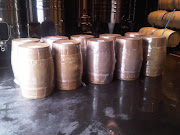 We all carefully unloaded the barrels from the truck into the cellar – there .