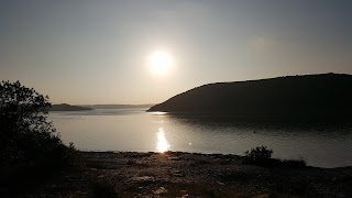 Sun setting over the river Camel, Cornwall