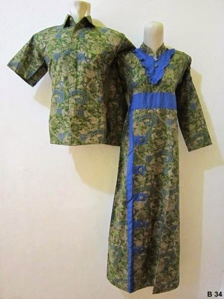 Contoh model gamis batik kombinasi brokat polos dua warna 