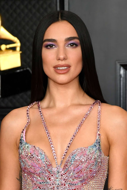 Dua Lipa best red carpet fashion dresses photo