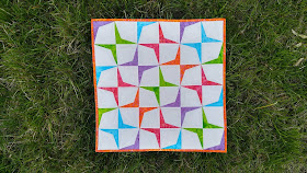 Island Batik paper pieced Boomerang mini quilt by Slice of Pi Quilts