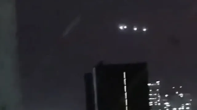 Chile quadruple UFO sighting over skyscraper 2023.