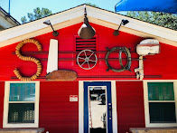 front of The Sloop restaurant building in Gulf Shores AL