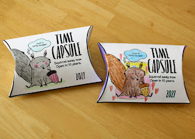 Our completed Savvy Shopper time capsules. I colored my squirrel gray since Tessa chose brown. She thought my pink acorn totally nutty.