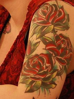 Tattooed Woman in red Red Roses