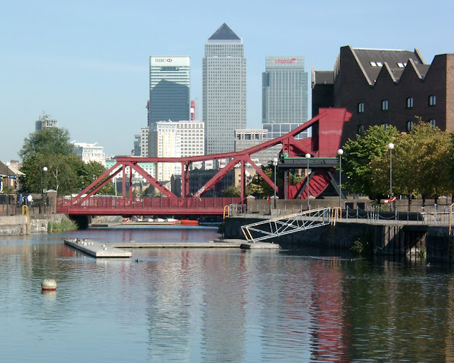 An old bascule bridge, Canary Wharf in background, Wapping Wall, Shadwell Basin, Wapping, London