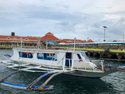 A motorized outrigger boat in Caticlan Jetty Port