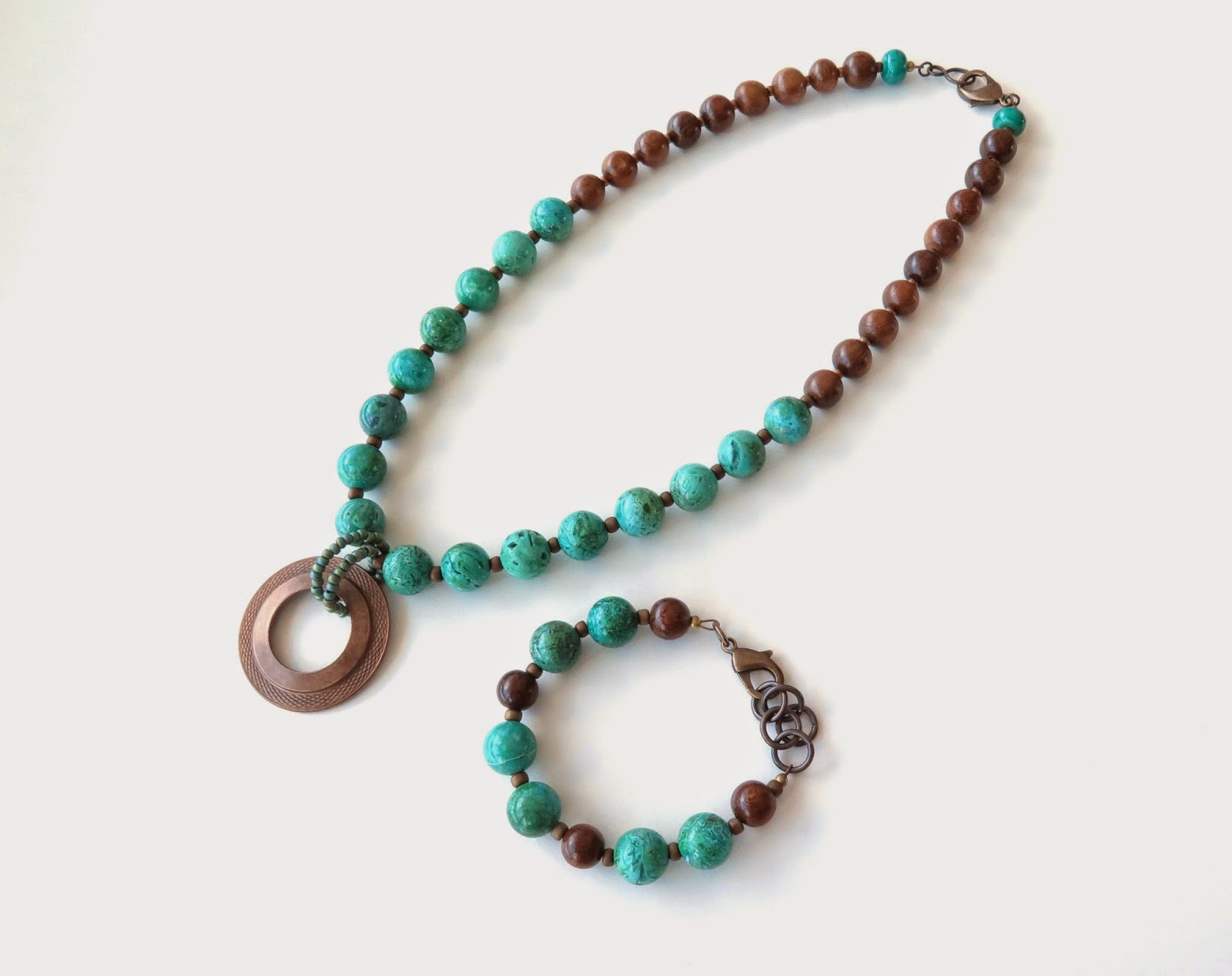 http://sashaandmax.bigcartel.com/product/alia-green-agate-and-wood-necklace