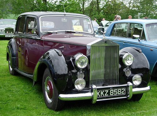 Oscar Bigi's 1938 Citroen Big 6 and the diminutive 1950 Fiat 500 C of