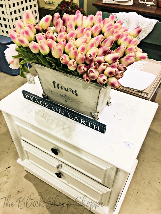 Use thrift store decor to create beautiful storage.