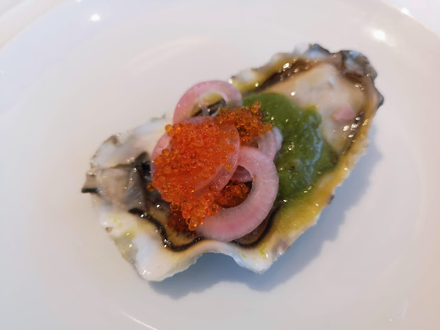 Fresh Jumbo Canadian Oyster with Salsa Taquera, Pickled Shallots and Tobiko
