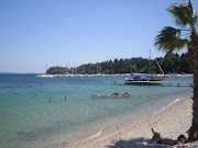 A place to anchor your boat to the far right of the beach.