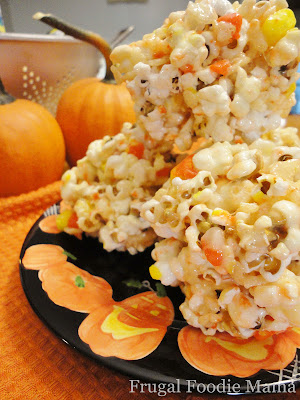 These sweet & salty Candy Corn Popcorn Krispie Balls are the perfect easy to make treat for a fall or Halloween celebration.