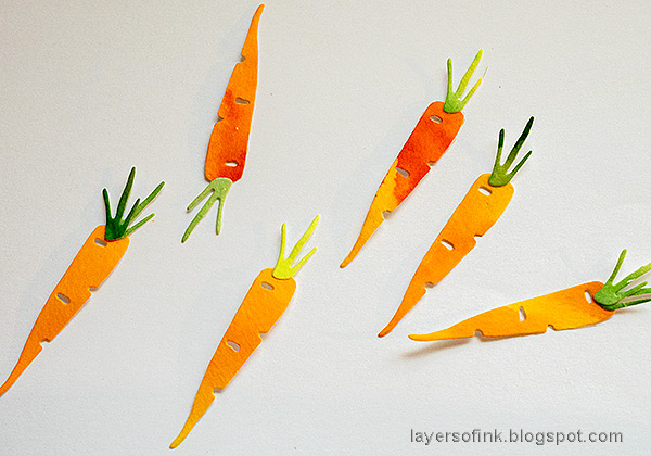 Layers of ink - Easter Altered Tin Tutorial by Anna-Karin Evaldsson. Die cut miniature carrots.