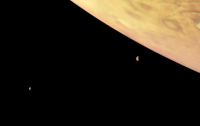 Jupiter, Io and Europa seen by Juno spacecraft
