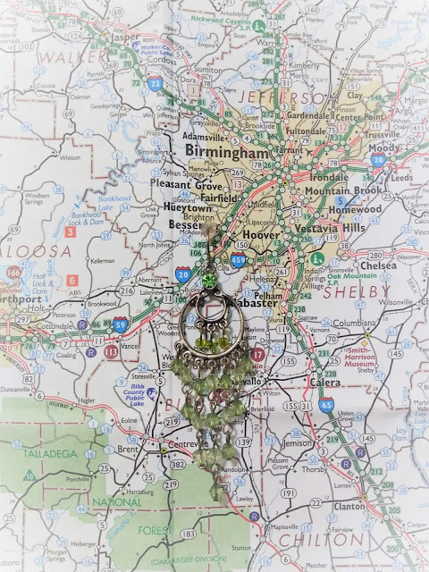 Widowed earring on Alabama map. February 2021.