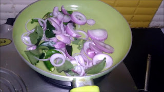 Once heated add in onions curry leaves and slit green chilli