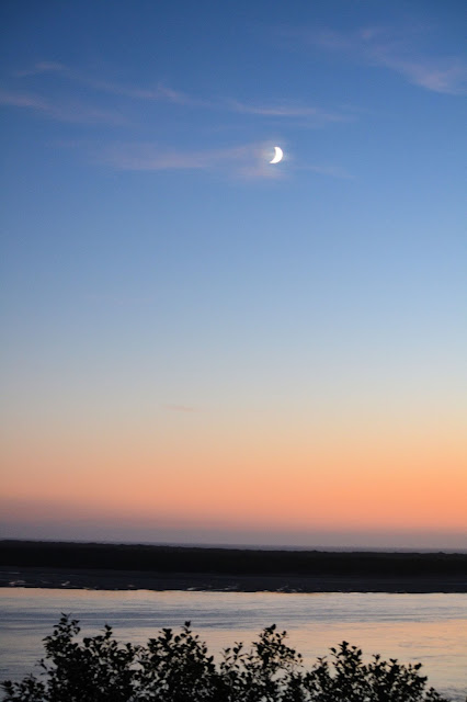 Photo of the moon over Netarts Bay Oregon by Nancy Zavada