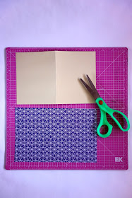 self-healing mat, scissors, card stock, scrapbook paper, craft materials