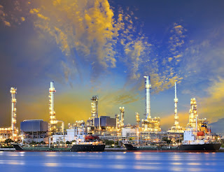 oil refinery with tanker ship