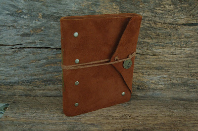 https://www.etsy.com/listing/248453386/rust-rivets-hand-bound-leather-journal-5?ref=related-0