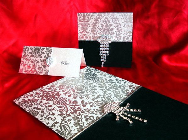 Your invitation wording is written on white pearl metallic card 