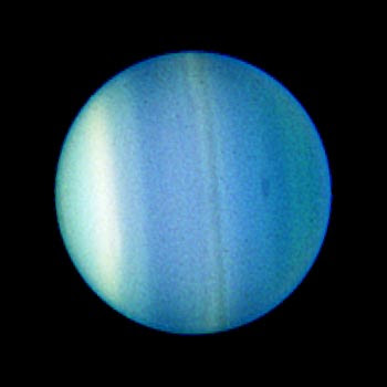 Uranus and one of its five major moons Ariel