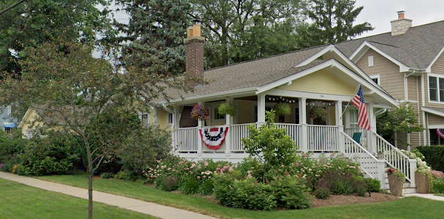 color photo of left side and front of pale yellow Sears Walton • 754 Euclid Avenue, Glen Ellyn, Illinois