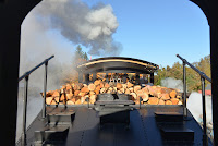 Locomotive 924's tender is piles high with Douglas fir firewood.