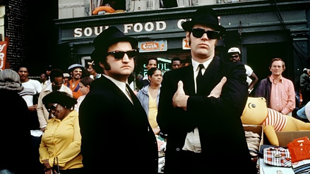 [DROPS] : JOHN BELUSHI, MÔNICA(S) & TRAILERS