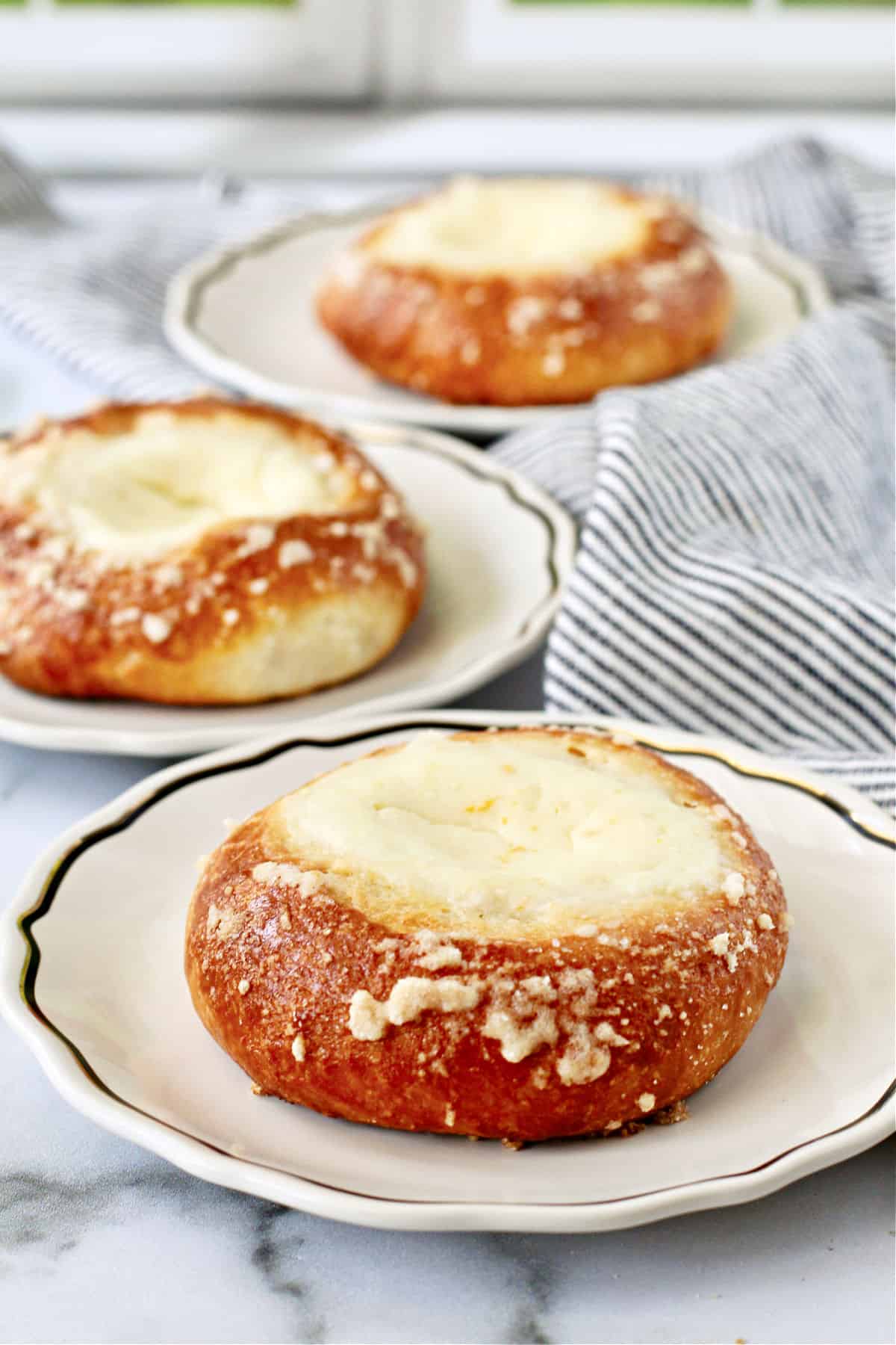 Czech Kolaches on three small plates.