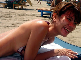Aline Tumbuan Topless On the Beach