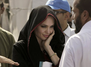 angelina jolie in pakistan, beauty of pakistan, angelina jolie hot, angelina jolie on bed, angelina jolie hairstyle, angelina jolie makeup, 