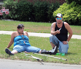 sexy sitting at parade, in grass, spread legs