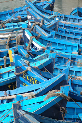 the old wooden blue fishing boats at essaouri port