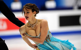Nora Hoffmann anticipating a wardrobe malfunctions during the Ice Dance short dance during the ISU Grand Prix of Figure Skating 2010 in Beijing on December 10, 2010.